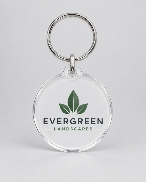 Illustrative business mockup. Clear acrylic keychain with Evergreen Landscapes logo