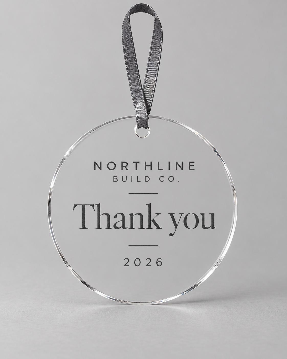Illustrative business mockup. Clear Northline Build Co. corporate thank-you ornament