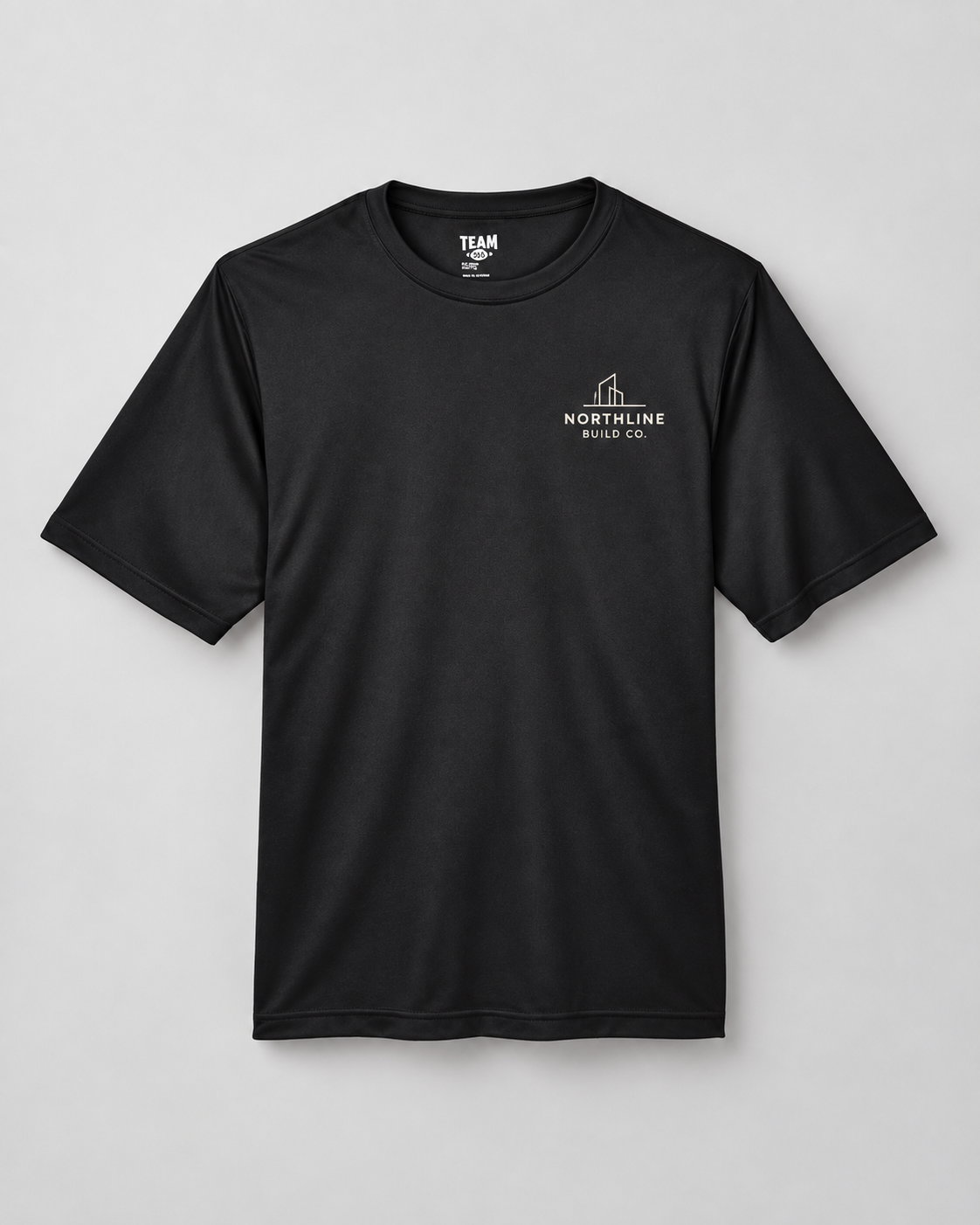 Illustrative business mockup. performance tee with a small printed company logo on the left chest
