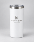Illustrative business mockup. White tumbler with single-tone Northline Build Co. engraving