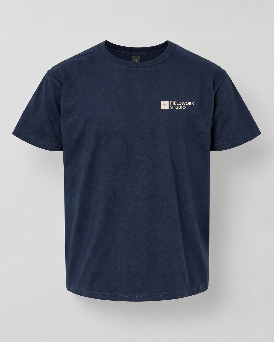 Illustrative business mockup. youth tee with a small printed company logo on the left chest