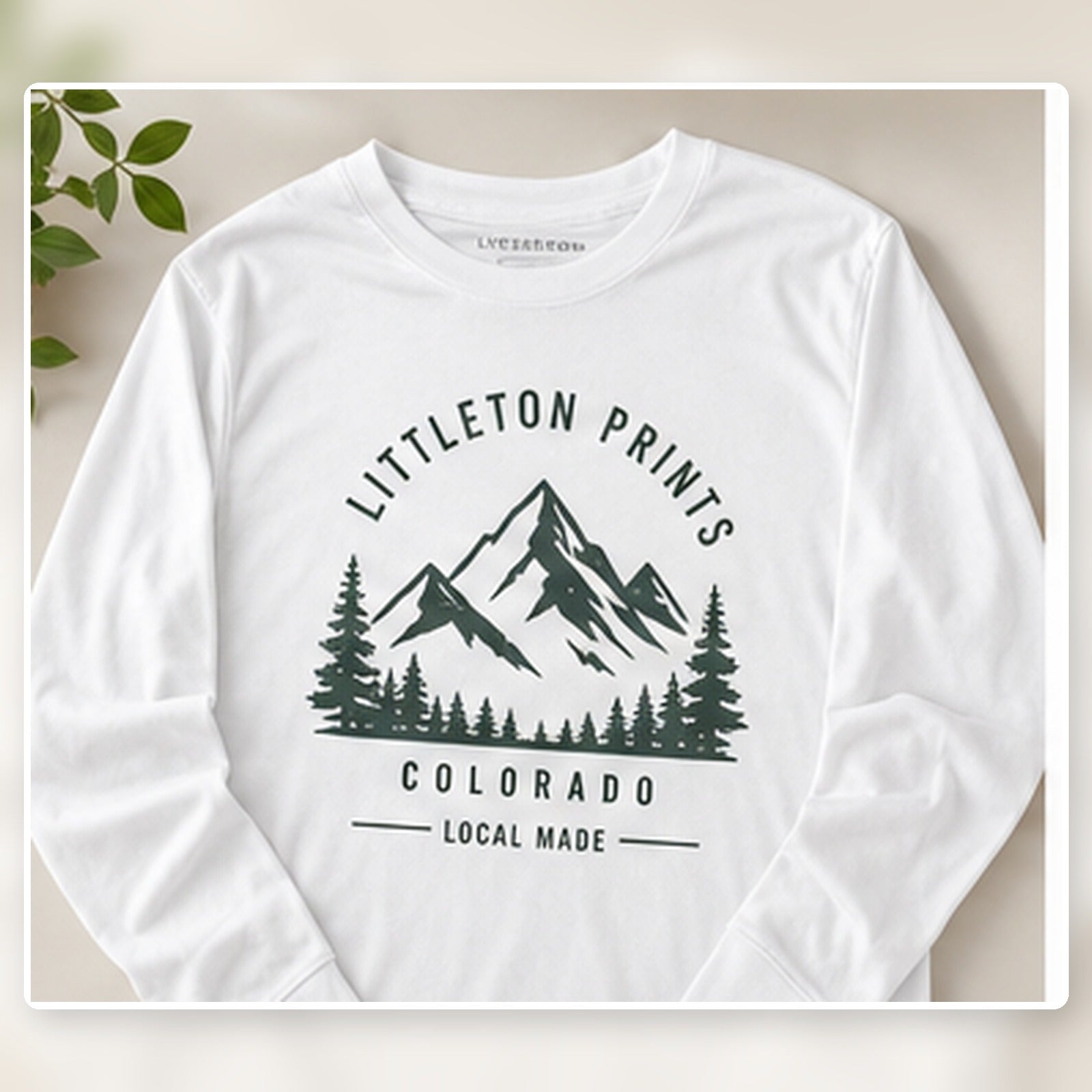 Custom long sleeve shirt with sample Colorado artwork on a bright studio background sample image